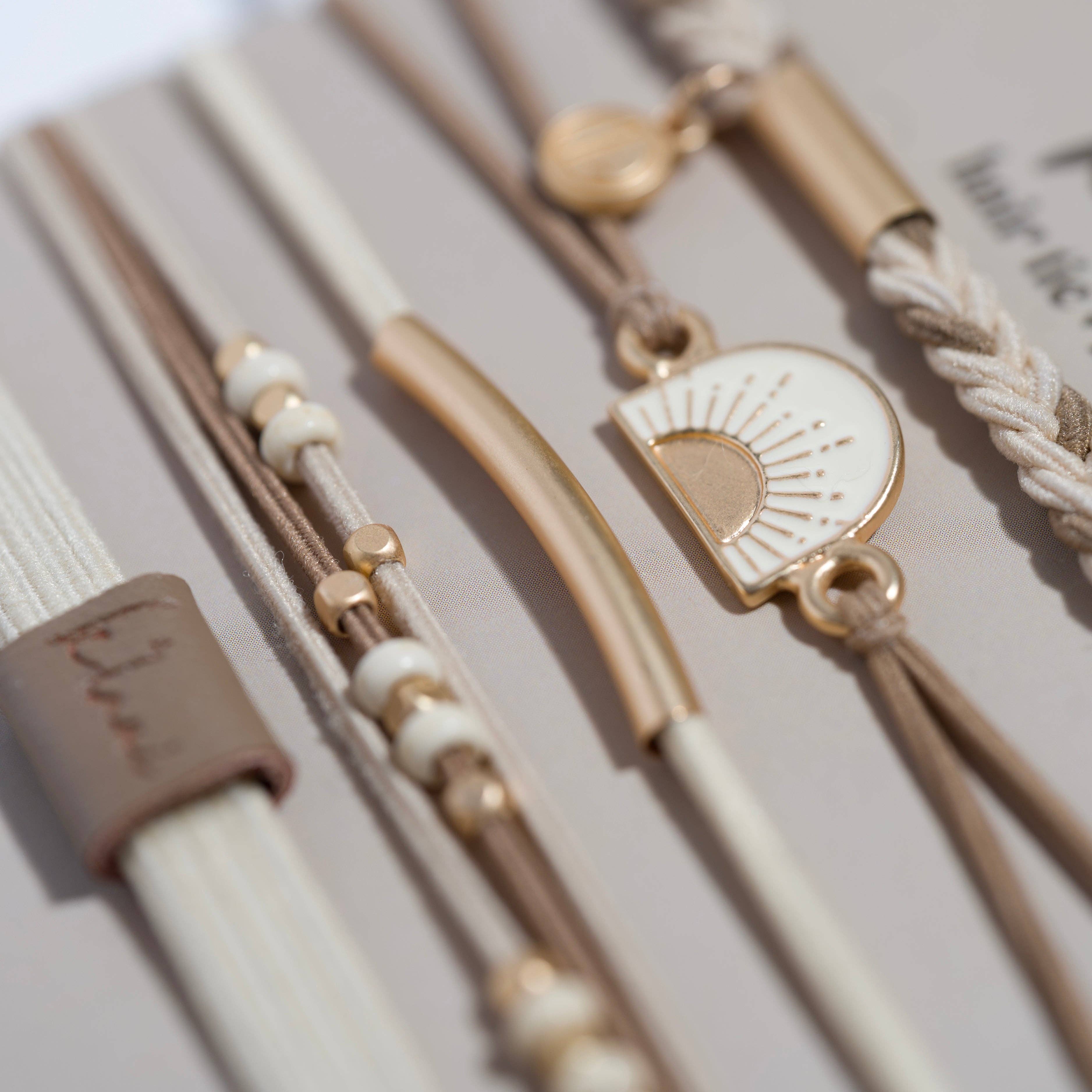 K'lani hair tie bracelets - "Rise" Cream and Tan With Gold and Sun Accents Hair Tie Bracelets